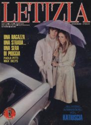 Una ragazza una strada... una sera di pioggia